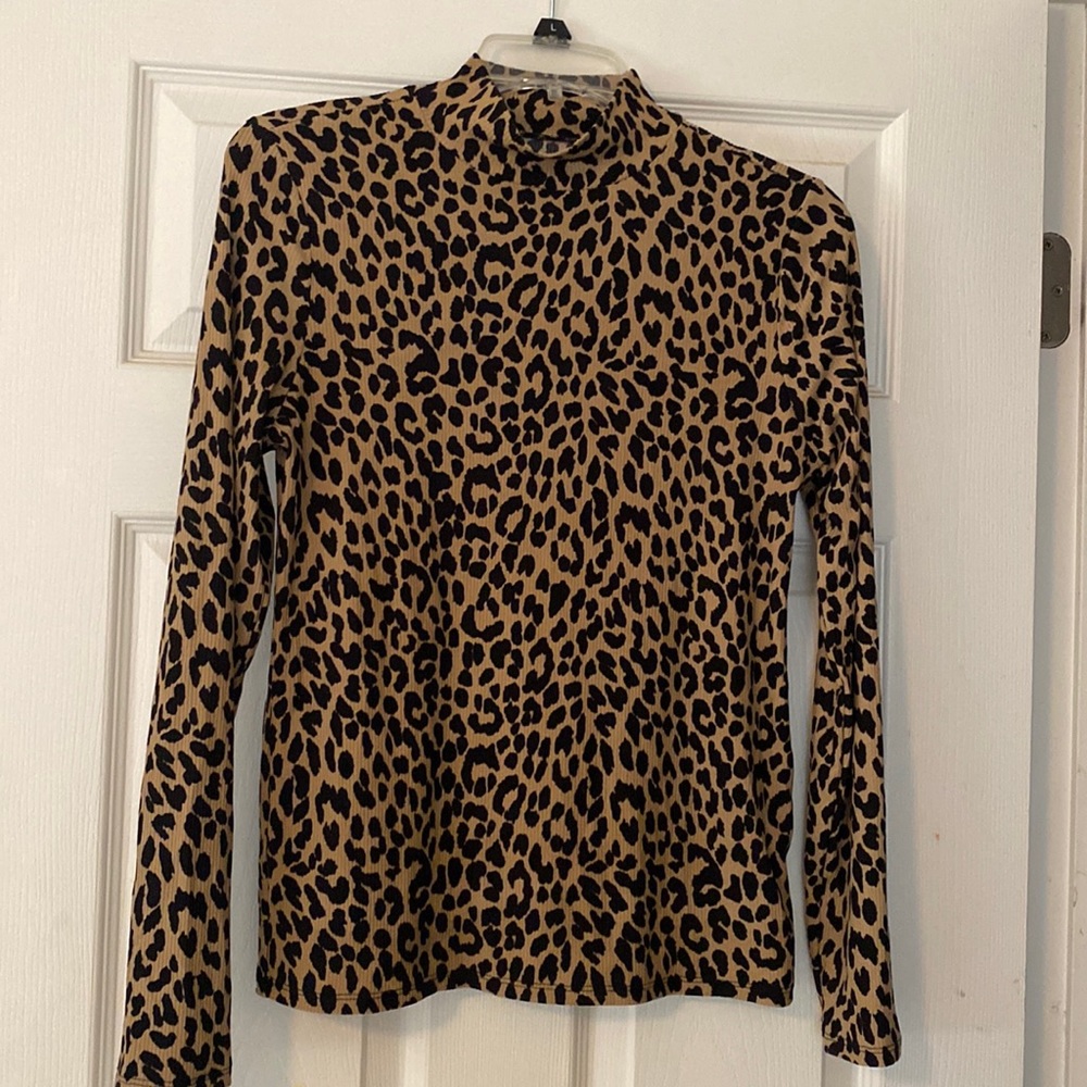 Large mock turtle neck long sleeved shirt with animal print